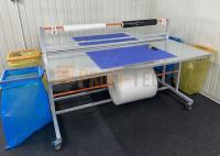 Mobilny stół do pakowania dwustronny na kołach blat zabezpieczony blachą