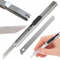 МЕТАЛЛИЧЕСКИЙ НОЖ ДЛЯ ОБИВКИ ОБОЕВ С СЛОМАННЫМ ЛЕЗВИЕМ