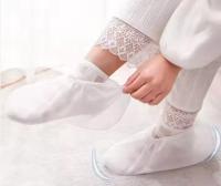 Одноразовые защитные носки из нетканого материала белые ножки из нетканого материала PP 100 шт.