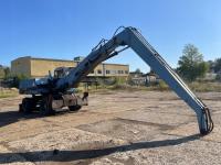 Экскаватор-погрузчик Fuchs 714, магнитный генератор