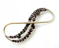 Okazała srebrna złocona broszka z granatami