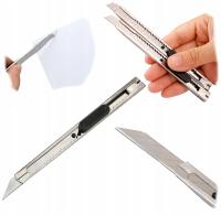 НОЖ ДЛЯ ОБОЕВ МЕТАЛЛИЧЕСКИЙ НАПРАВЛЯЮЩИЙ С СЛОМАННЫМ ЛЕЗВИЕМ 18 ММ НОЖ ДЛЯ ОБОЕВ