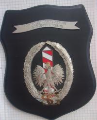 Pamiątkowa odznaka Straży Granicznej na tarczy herbowej
