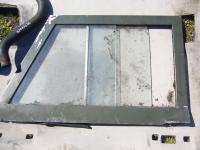 Land Rover DEFENDER - ramka drzwi z szybami lewy przód