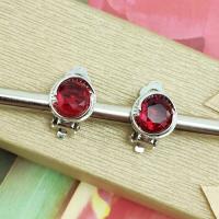 KLIPSY srebrne Kryształki oczko czerwone eleganckie małe jak kolczyki