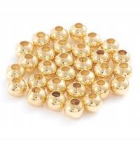 Koraliki przekładki złote ze stali nierdzewnej 3mm 100szt