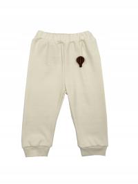 Kremowe spodnie niemowlęce dresy dla chłopca r.80
