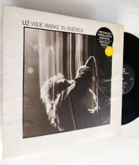 U2 = WIDE AWAKE IN AMERICA LP BAD (Live Aid) / LOVE COMES TUMBLING /USA '85