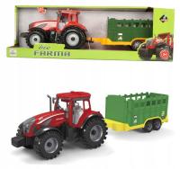 Traktor z zieloną przyczepą