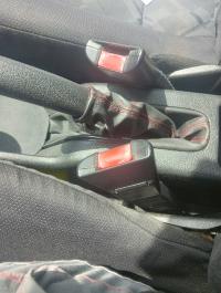 ZAPINKA PASA LEWY PRZÓD OPEL ASTRA J 13330865 13330867