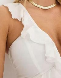 ELEGANCKI KOMBINEZON Z SZYFONU uju