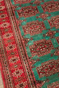 ręcznie tkany wełniany dywan vintage w odcieniach zieleni