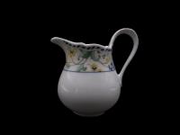 Porcelanowy mlecznik TCM