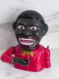 SKARBONKA Z ŻELIWA MURZYNEK W CZERWONEJ KOSZULI SUPER PREZENT